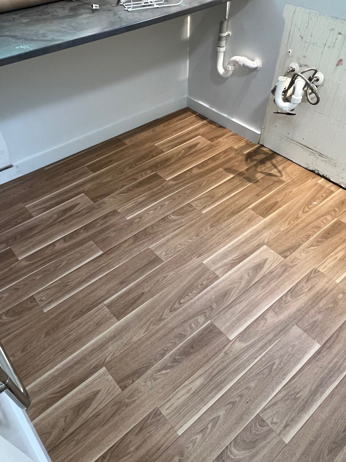 Timber-look plank flooring freshly laid by ZW Flooring